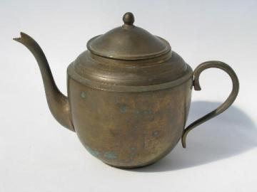 catalog photo of small solid brass teapot, tea for one or two