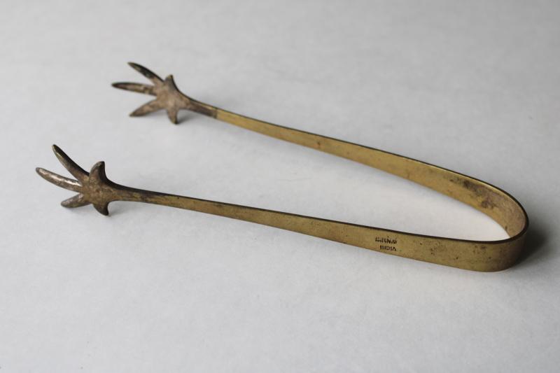 photo of small solid brass tongs w/ gothic style bird foot or claws shape, vintage Halloween #1