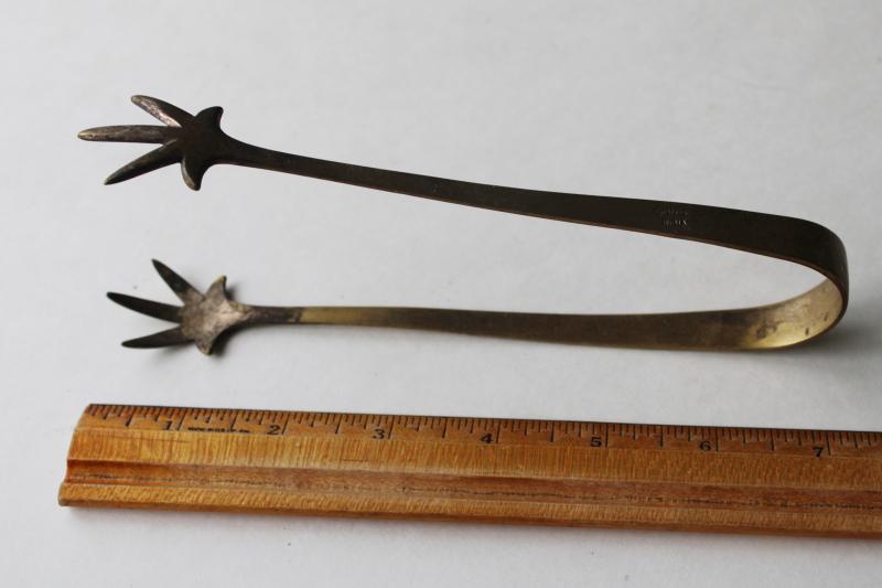 photo of small solid brass tongs w/ gothic style bird foot or claws shape, vintage Halloween #2