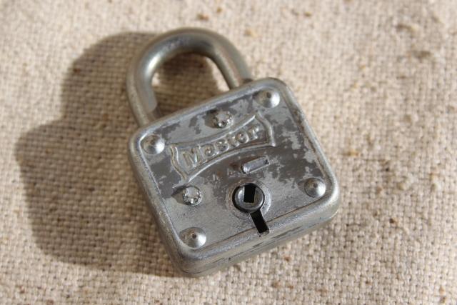 photo of small steel Master Lock Milwaukee Wisconsin vintage padlock, no key, locked #1