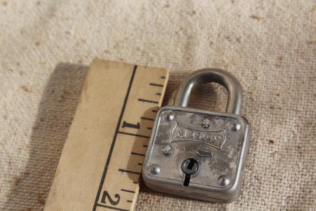 photo of small steel Master Lock Milwaukee Wisconsin vintage padlock, no key, locked #3