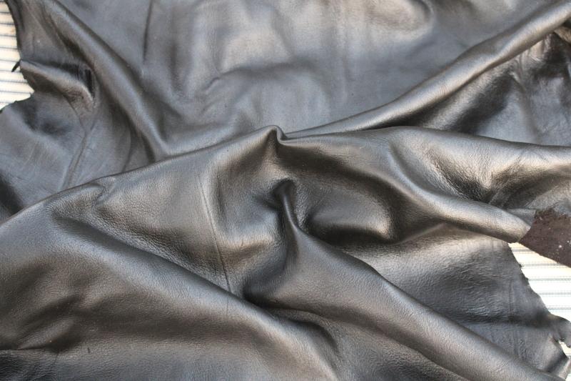 photo of smooth soft tanned deer hide black leather lot deerskin, seven full hides + #5