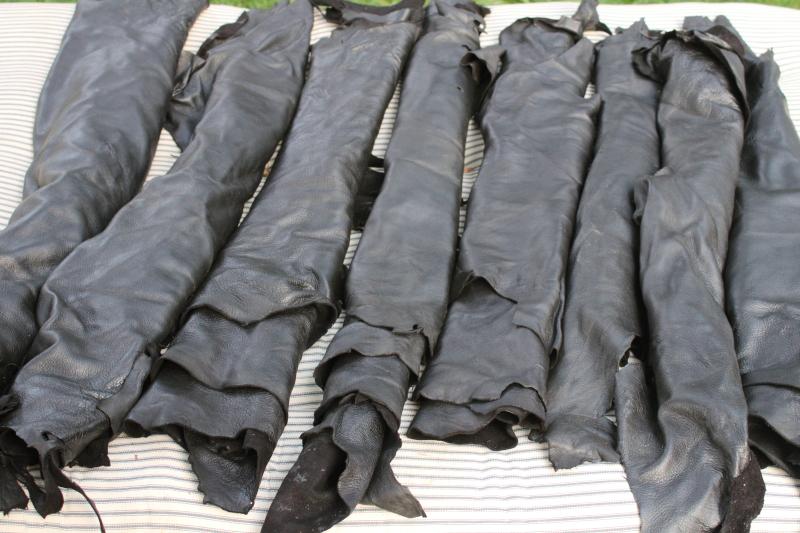 photo of smooth soft tanned deer hide black leather lot deerskin, seven full hides + #7