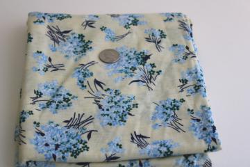 catalog photo of smooth soft vintage cotton t-shirt knit fabric, blue & cream girly floral print