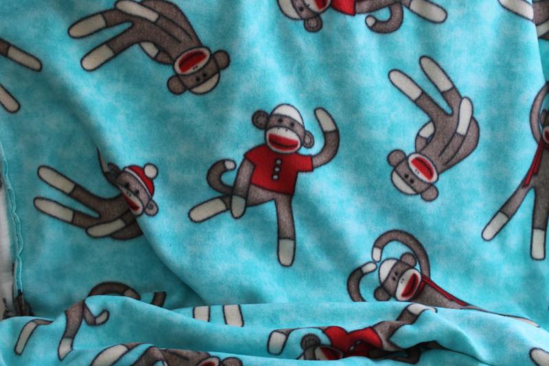 photo of sock monkey print fleece fabric for blanket or sewing, soft new material #1