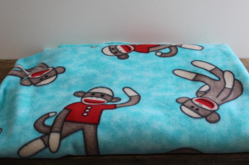 photo of sock monkey print fleece fabric for blanket or sewing, soft new material #3