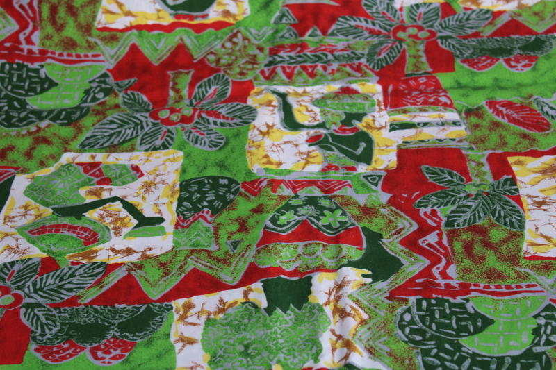 photo of soft cotton fabric w/ Africa ethnic print, people & palm trees in greens & red block print style #1