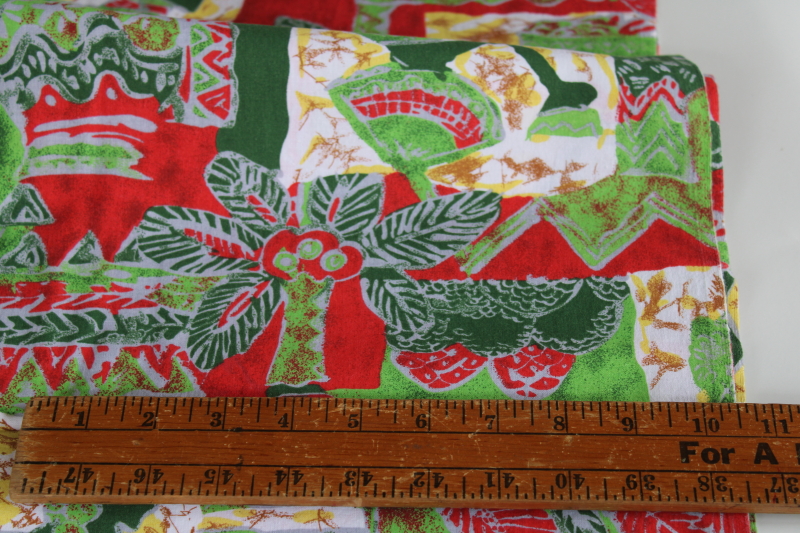 photo of soft cotton fabric w/ Africa ethnic print, people & palm trees in greens & red block print style #2