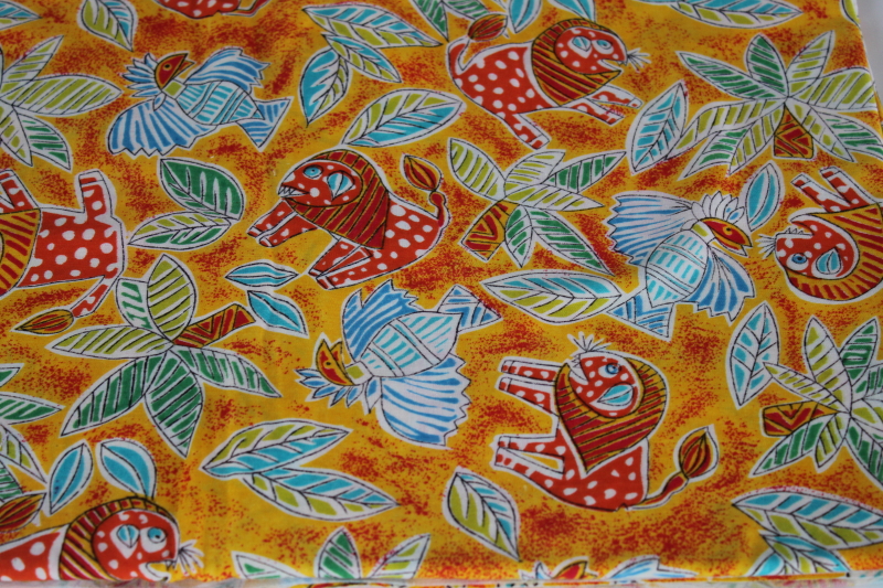 photo of soft cotton fabric w/ colorful ethnic print, lions, palm trees, lightning birds #1