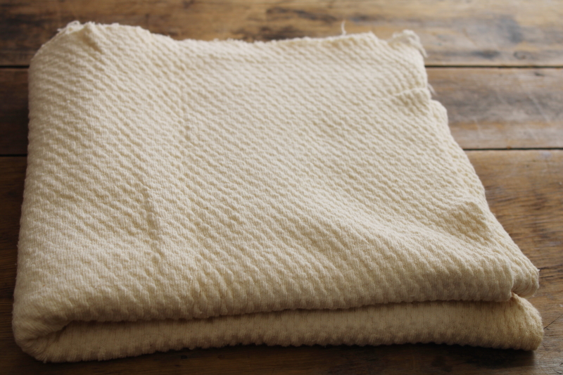 photo of soft thick natural cotton sweater knit fabric, vintage aran style knitted texture #1