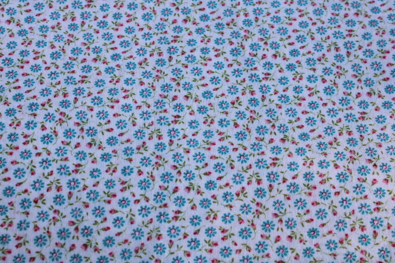 photo of soft vintage cotton fabric tiny flowers print ditsy floral aqua blue daisies #1