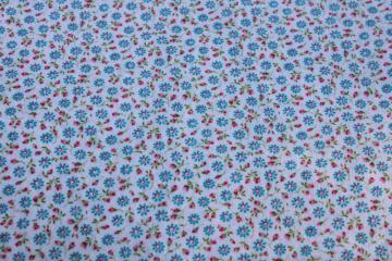 catalog photo of soft vintage cotton fabric tiny flowers print ditsy floral aqua blue daisies