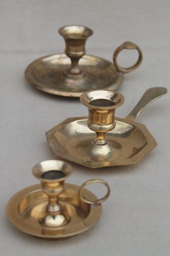 photo of solid brass candle holders, collection of vintage chamber candlesticks w/ handles #1