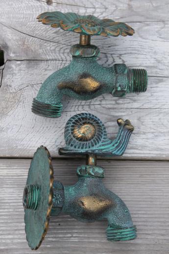 photo of solid brass garden hose faucet taps, verdigris bronze snail & flower tap #1