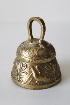catalog photo of solid brass sanctuary bell pelican, lamb, eagle, lion icons, old monastery bell 