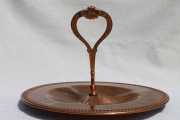 catalog photo of solid copper buffet server, olive dish w/ center handle, 60s vintage serving piece