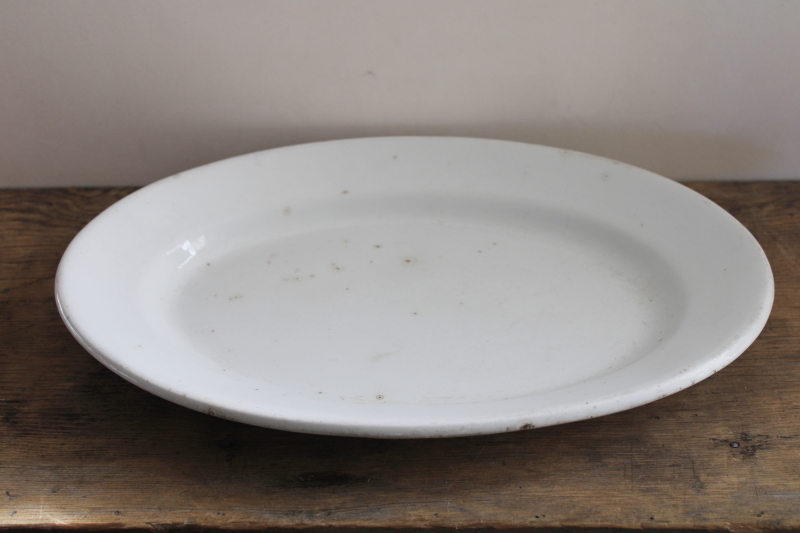 photo of stack of antique ironstone platters, heavy white china w/ early England backstamps #4