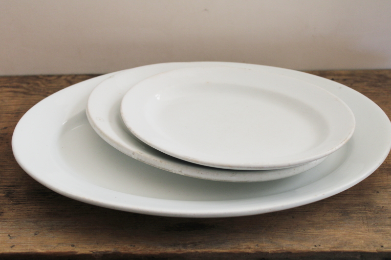 photo of stack of antique white ironstone platters, vintage farmhouse kitchen serving ware #7