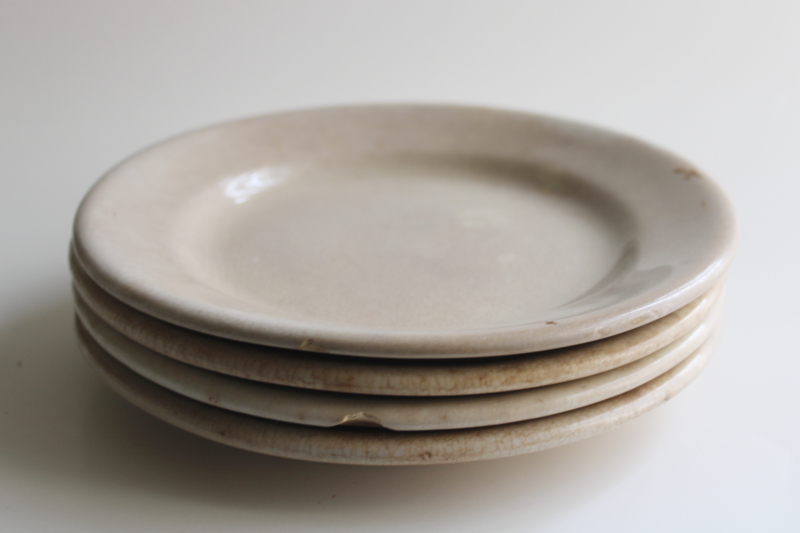 photo of stack of chunky antique English ironstone china plates, browned stained crazing patina  #8