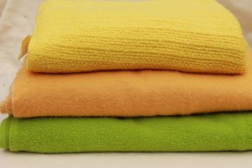 catalog photo of stack of soft vintage acrylic bed blankets, 60s 70s retro harvest gold & lime green