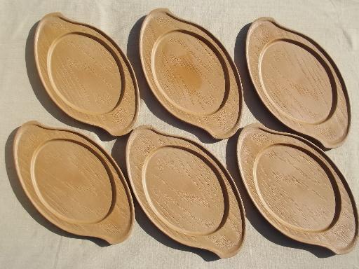 photo of steakhouse style sizzling steak plates, oval stainless platters w/ wood boards #3