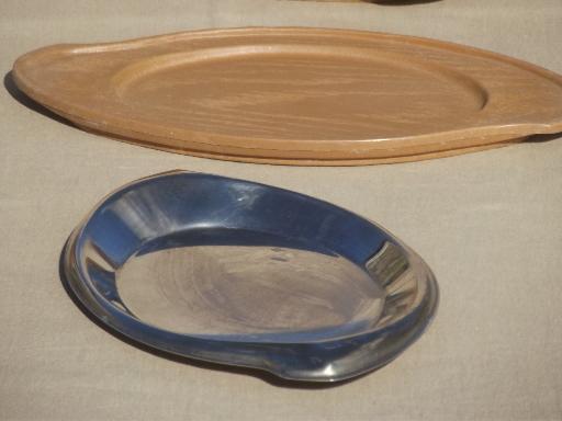 photo of steakhouse style sizzling steak plates, oval stainless platters w/ wood boards #4