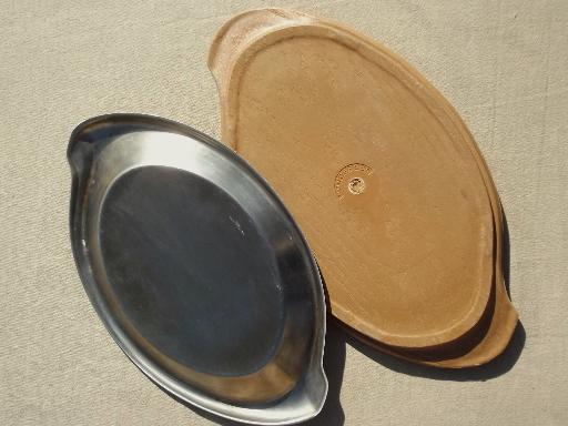 photo of steakhouse style sizzling steak plates, oval stainless platters w/ wood boards #7