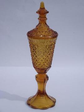 catalog photo of tall amber glass candy jar, vintage diamond point or waffle pattern glass