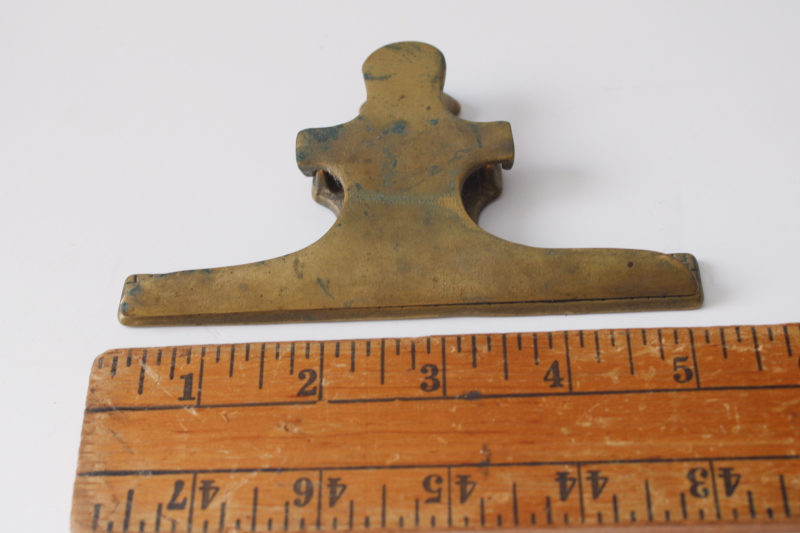 photo of tarnished vintage solid brass desk papers clip, large spring clip for paper organization, storage or display  #2