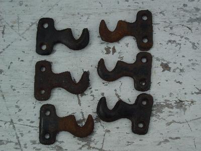 photo of three pair of antique curtain rod mounting brackets #1