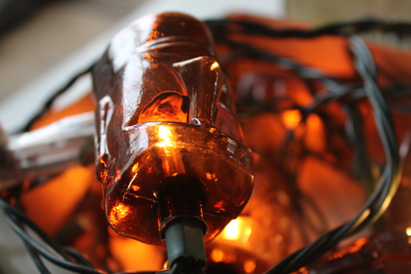 photo of tiki head mini lights, retro party or bar decor, root beer brown plastic tikis w/ long light bulbs  #3