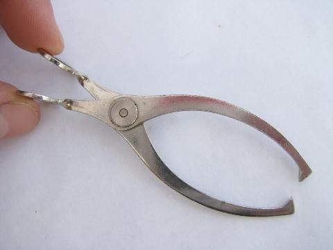 photo of tiny 1920s vintage sugar cube tongs, nickel plate over steel #2