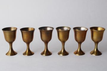 catalog photo of tiny brass goblets, drinking glasses or candle holders, tarnished vintage brass made in India 