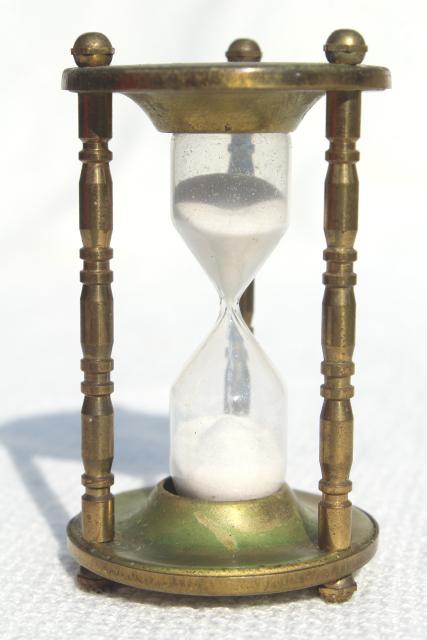 photo of tiny brass hourglass made in England, five minute timer, vintage kitchen timer #1