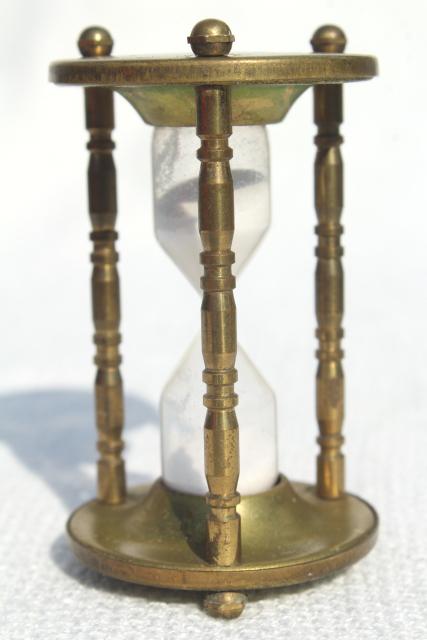 photo of tiny brass hourglass made in England, five minute timer, vintage kitchen timer #2