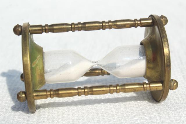 photo of tiny brass hourglass made in England, five minute timer, vintage kitchen timer #3