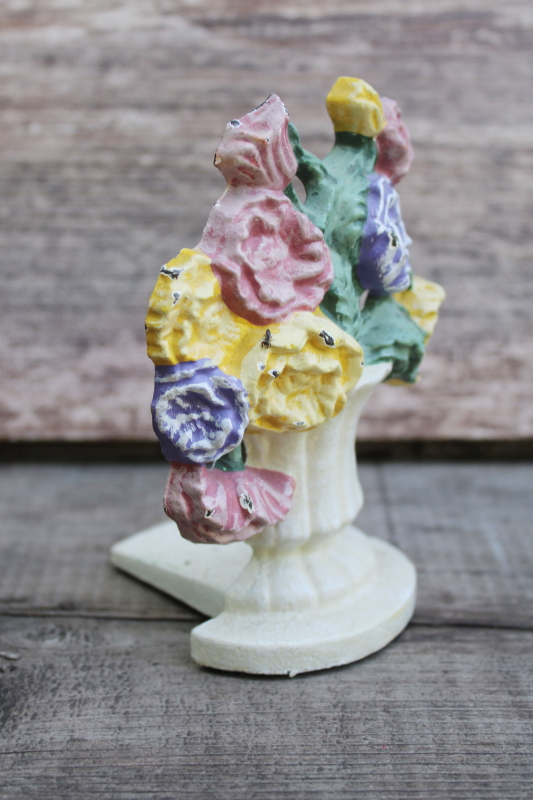 photo of tiny cast iron doorstop, chippy paint bouquet of flowers vintage door stop  #1