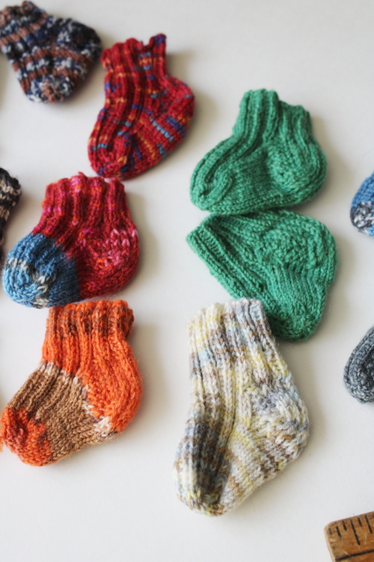 photo of tiny hand knitted socks lot singles and pairs, handmade stockings or ornaments for hanging, garland etc #6