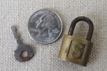 catalog photo of tiny old brass padlock with working key, for diary journal lock or jewelry box?