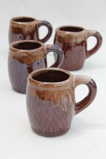 photo of tiny old brown drip glaze pottery beer steins, vintage shot glasses set #1