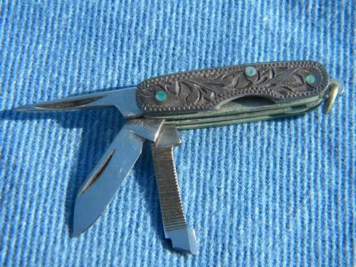 photo of tiny old tooled sterling silver pocket knife w/western leather case #1