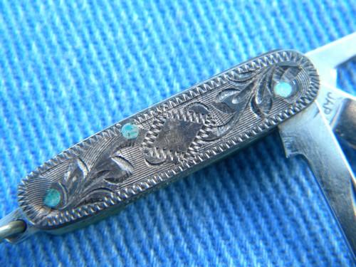 photo of tiny old tooled sterling silver pocket knife w/western leather case #2