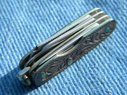 photo of tiny old tooled sterling silver pocket knife w/western leather case #6