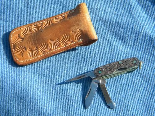 photo of tiny old tooled sterling silver pocket knife w/western leather case #7