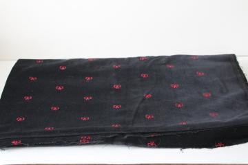 catalog photo of tiny red bows embroidered black cotton velveteen fabric, coquette goth girly 