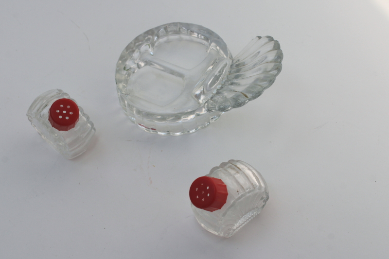 photo of tiny salt and pepper shakers in glass caddy tray, vintage clear glass S&P w/ red plastic lids #3