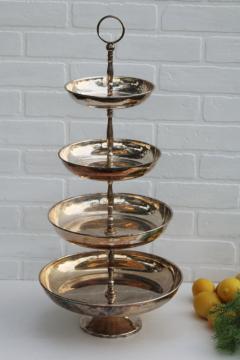 catalog photo of towering silver plate centerpiece, five tiered tray for buffet server, holiday fruit, wedding flowers