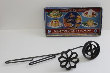 catalog photo of traditional circle & flower rosette iron molds, antique vintage Griswold box