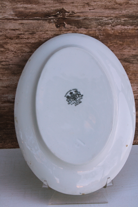 photo of trio of heavy white ironstone china platters vintage English backstamps, stack of chunky oval plates #7