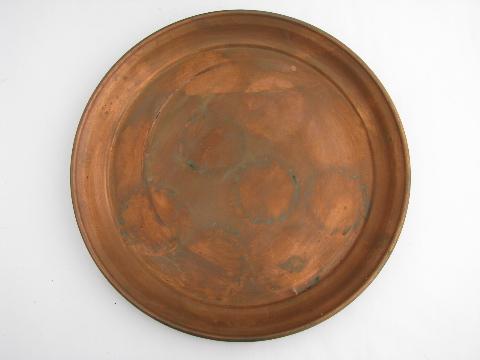 photo of two large round heavy solid copper trays, vintage West Bend #2